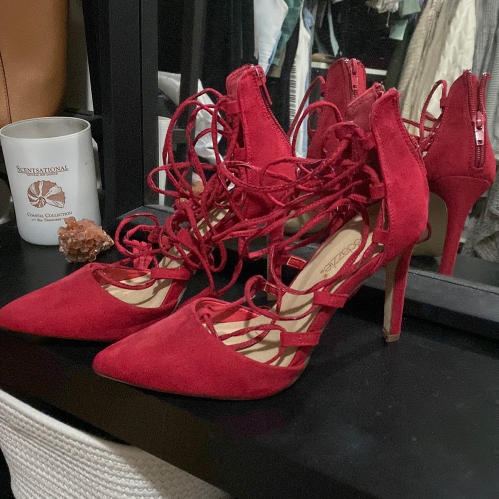 Red suede pointed toe lace up stilettos
